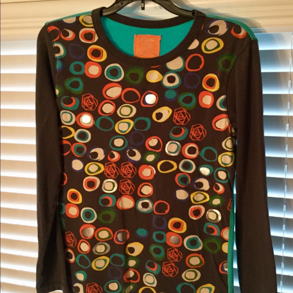 FUN Circle shirt. The back is color blocked.
